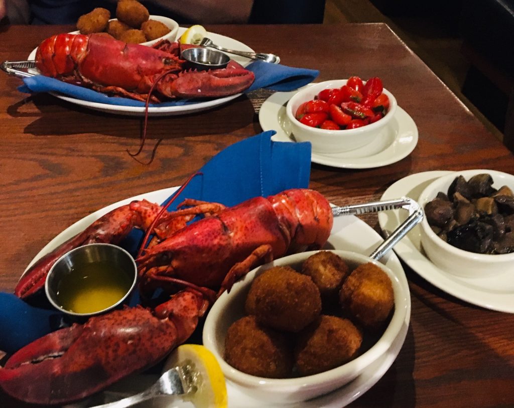 Summerhouse: hush puppies, lobster, mushrooms and tomatoes
