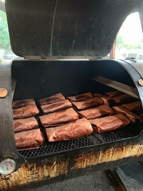 Packages of Brisket in the Smoker