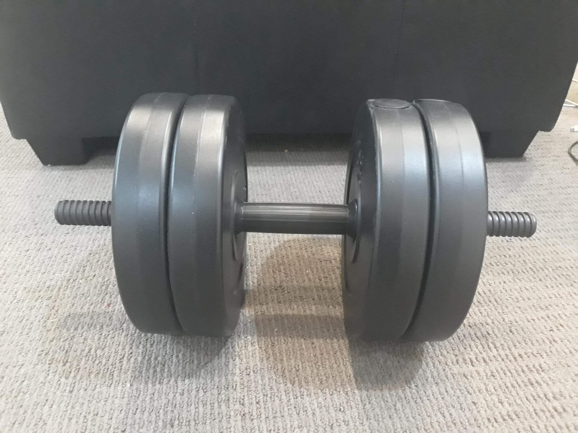 Grey weights on a small bar