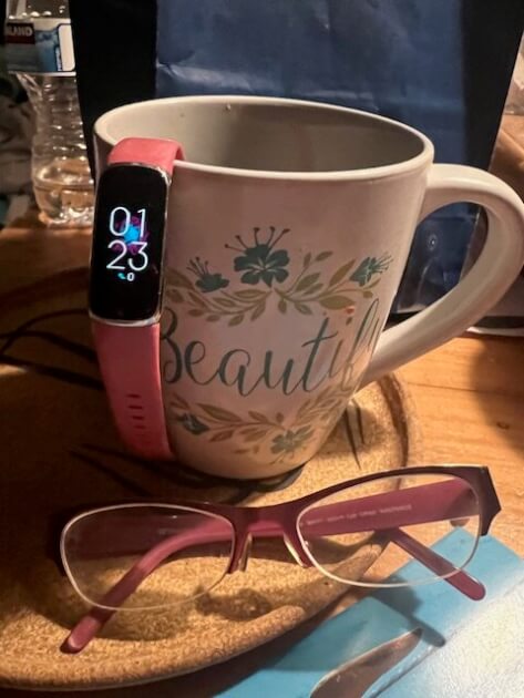 glasses, mug & fitbit
