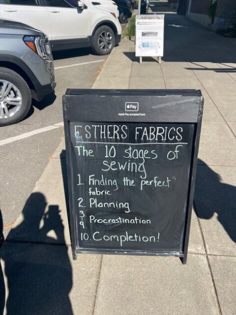 Funny sign outside Esther's Fabrics store on Bainbridge Island, WA<br />
