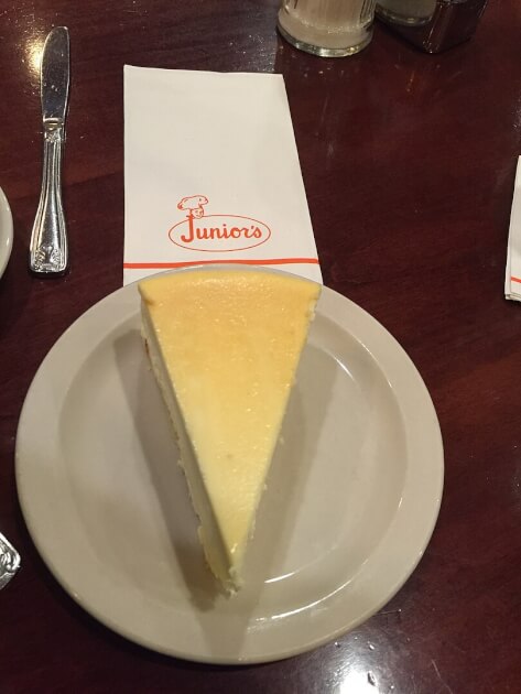 slice of Junior's cheesecake in NYC