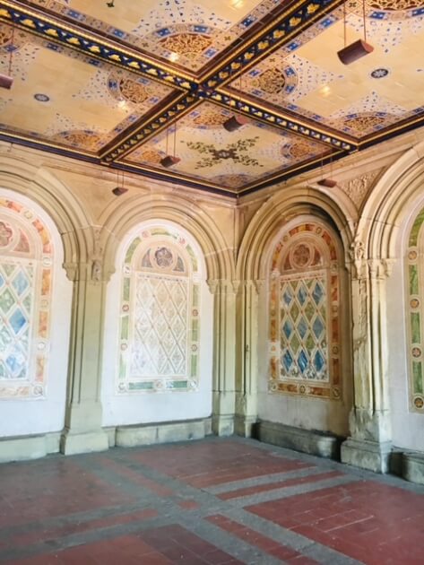 Inside the ornately tiled portico of the  Bethesda Terrace in Central Park NYC<br />
